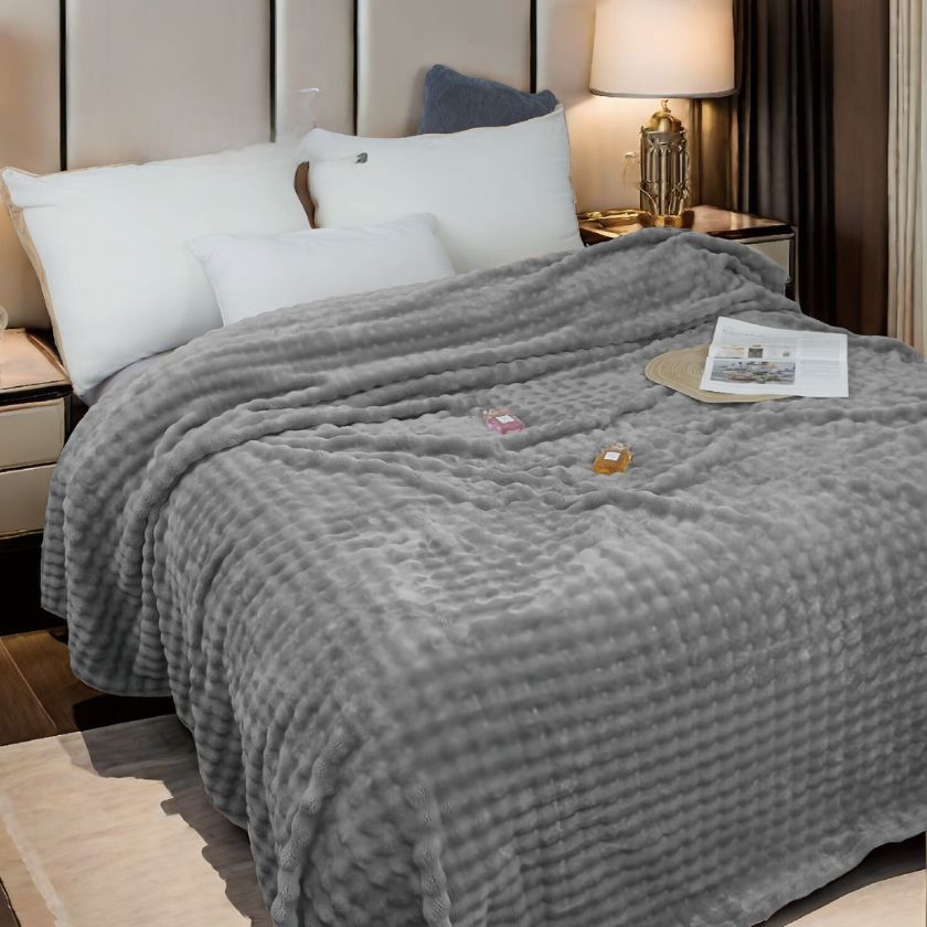 Super soft premium AC blanket by The Gharnish, featuring plush bedding material in a cozy, inviting style.