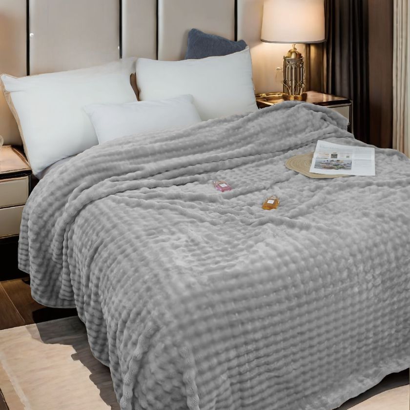 Super soft premium AC blanket from The Gharnish, featuring plush bedding material in a cozy, lightweight design.