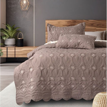 The Gharnish Swrill quilted bedding set of 3 with unique design, featuring textured patterns and soft fabric for a stylish bedroom look.