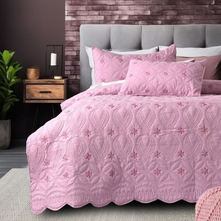 Set of three quilted bedding bedcovers by The Gharnish, featuring unique stitched design and cozy texture for stylish bedroom decor.