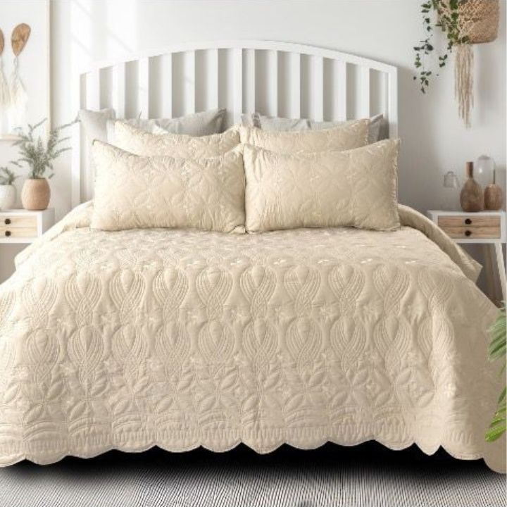 Set of three Swrill quilted bedding bedcovers by The Gharnish featuring a unique, stylish design for a cozy bedroom decor.