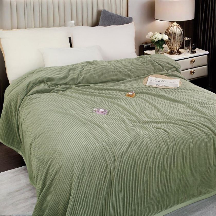The Gharnish double bed AC blanket in a cozy, stylish design, perfect for staying warm during hot weather.