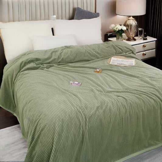 The Gharnish double bed AC blanket in a cozy, stylish design, perfect for staying warm during hot weather.
