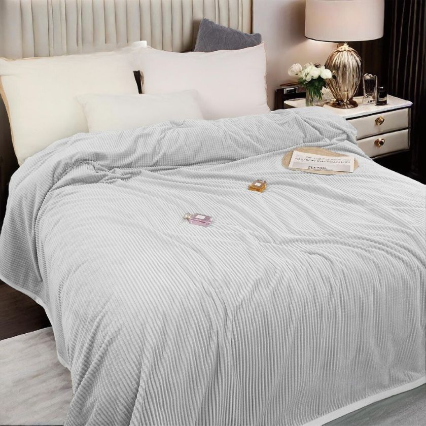 Double bed AC blanket by The Gharnish, cozy and soft blanket for cooling comfort on a double bed.