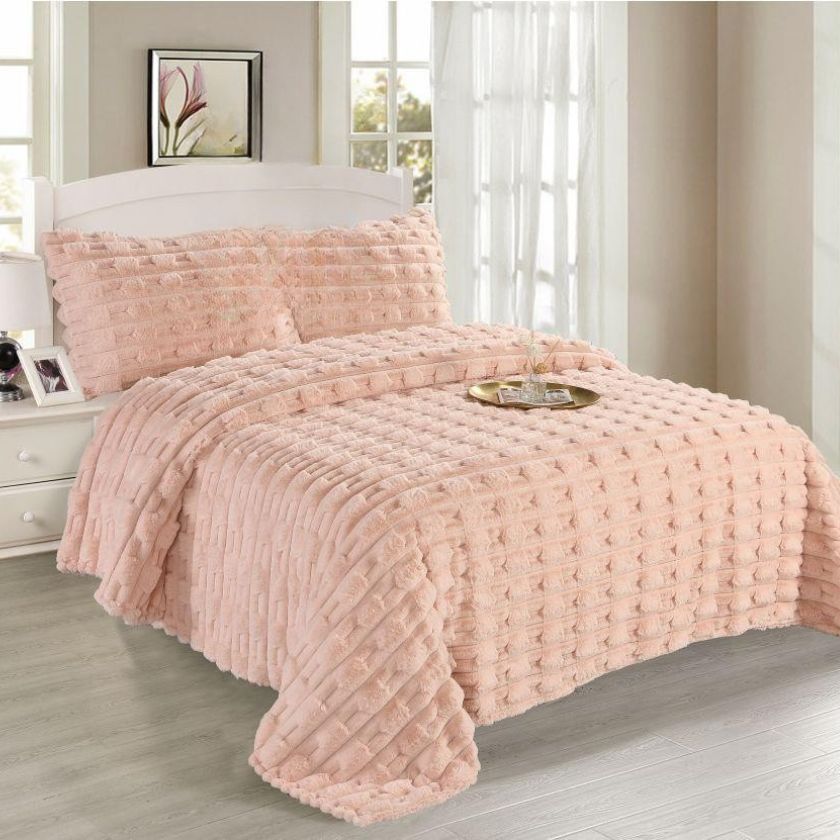Luxurious rabbit fur blanket by The Gharnish, featuring supersoft, plush fabric perfect for cozy bedding.