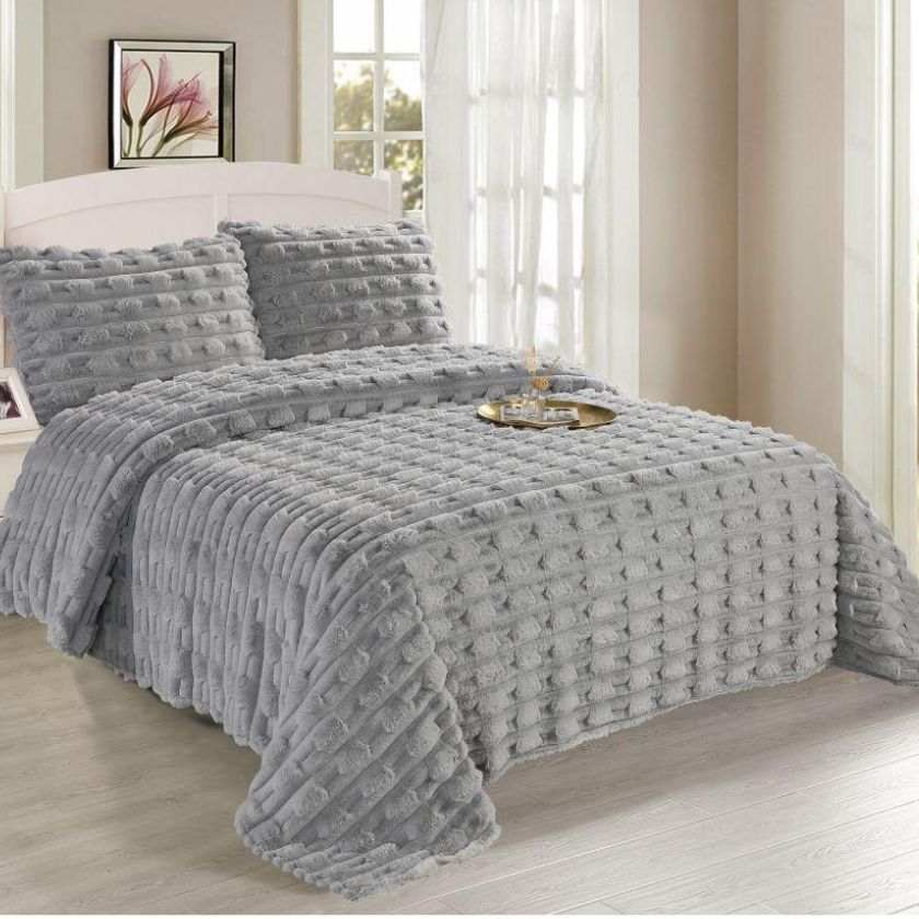 Supersoft luxury rabbit fur blanket by The Gharnish, plush and cozy blanket for a warm, elegant bedroom accent.