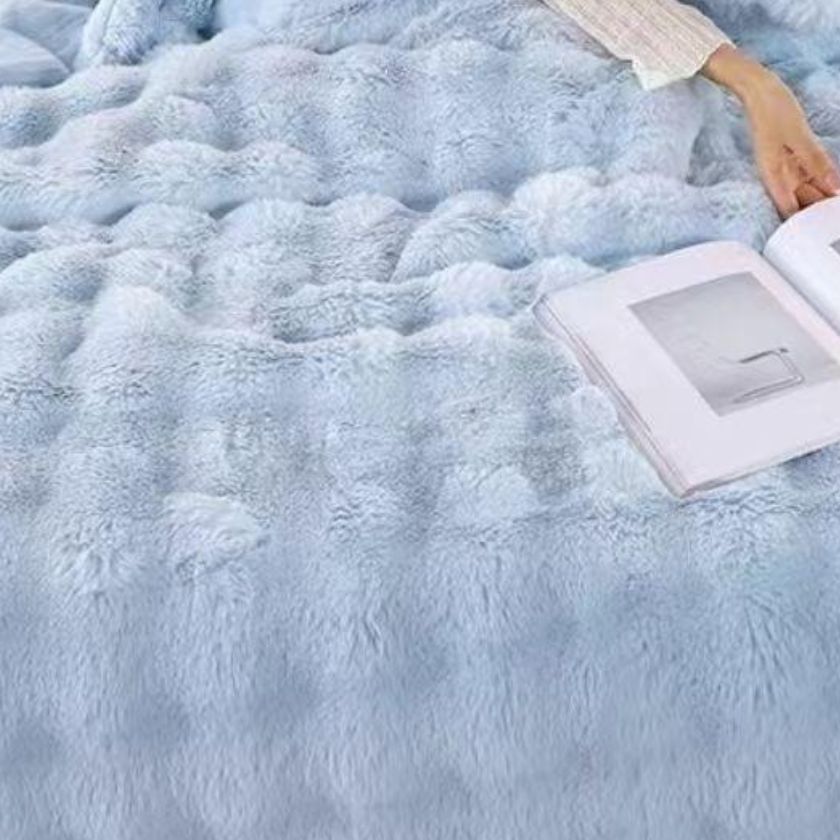 Luxury rabbit fur double bed winter quilt by The Gharnish, ultra warm, plush blanket perfect for cold weather.