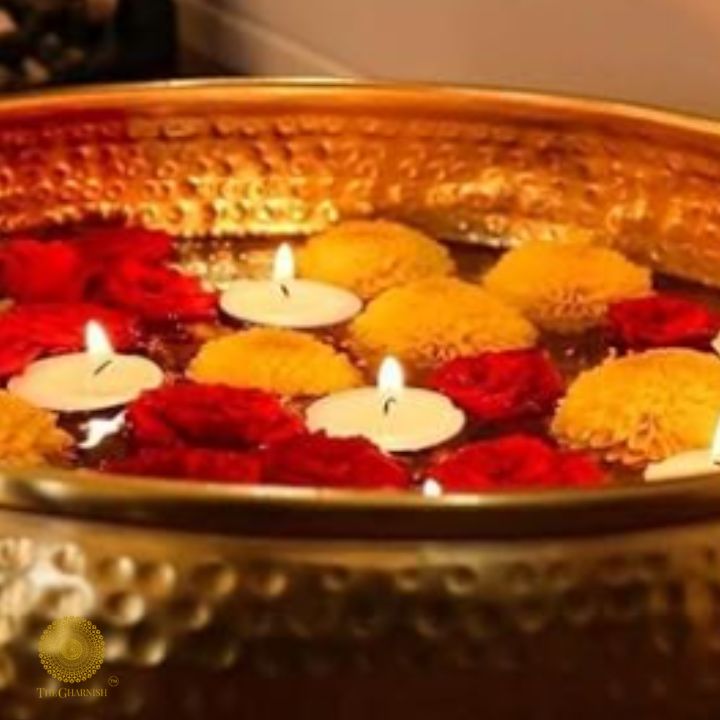 Brass traditional decorative Urli bowl from The Gharnish, used for pooja and festive decoration.