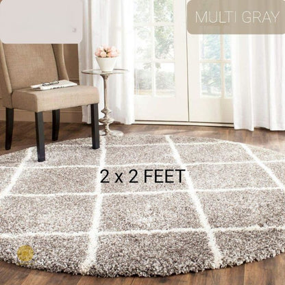 Beige round-shaped modern bedroom or dining room carpet by The Gharnish, 2x2 feet, soft and stylish for contemporary spaces.