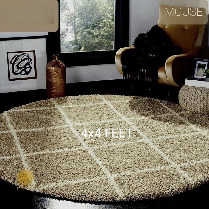 Beige round-shaped modern carpet by The Gharnish, ideal for bedroom or dining room, measuring 2x2 feet.