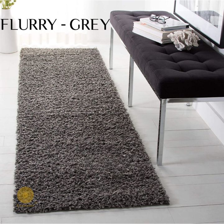 Grey Flurry bedside runner carpet by The Gharnish, with a soft, textured design suitable for home bedroom or hallway decor.