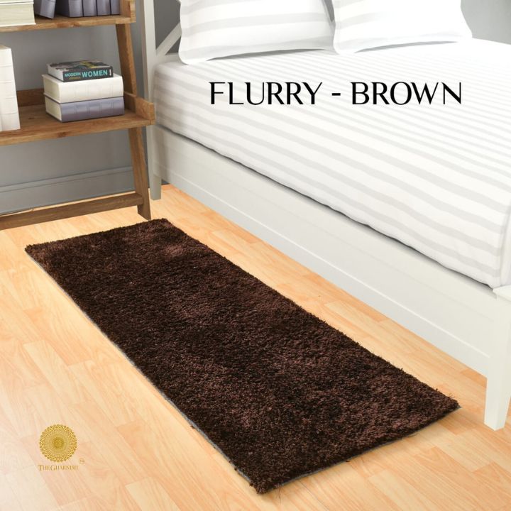Gray Flurry Bedside Runner by The Gharnish, soft plush carpet with a cozy design ideal for home bedroom decor.