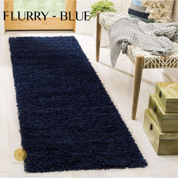 Grey Flurry Bedside Runner Carpet by The Gharnish, soft woven textile ideal for adding comfort and style to bedroom spaces.