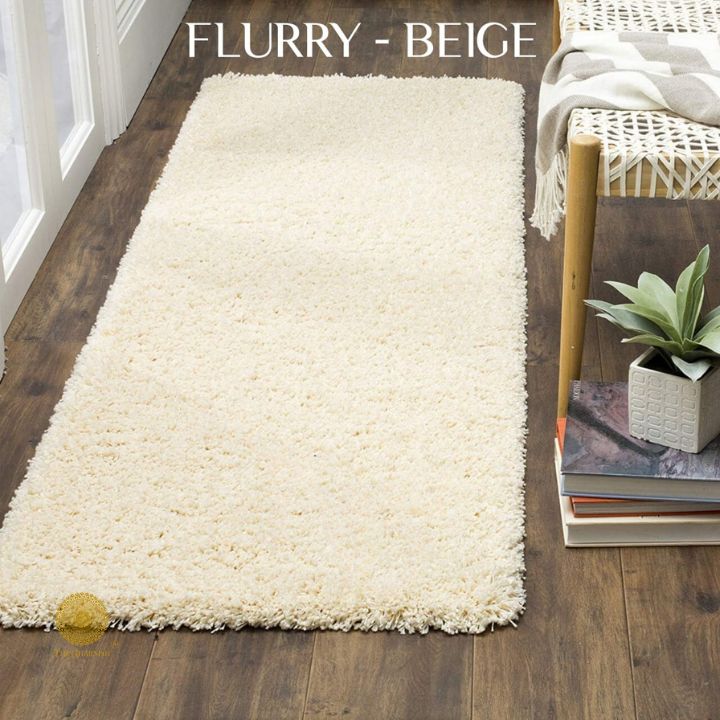 Grey Flurry bedside runner carpet by The Gharnish, featuring soft plush fabric and decorative edge details for home décor.