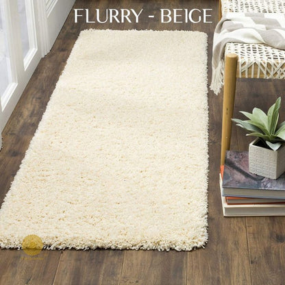 Grey Flurry bedside runner carpet by The Gharnish, featuring soft plush fabric and decorative edge details for home décor.