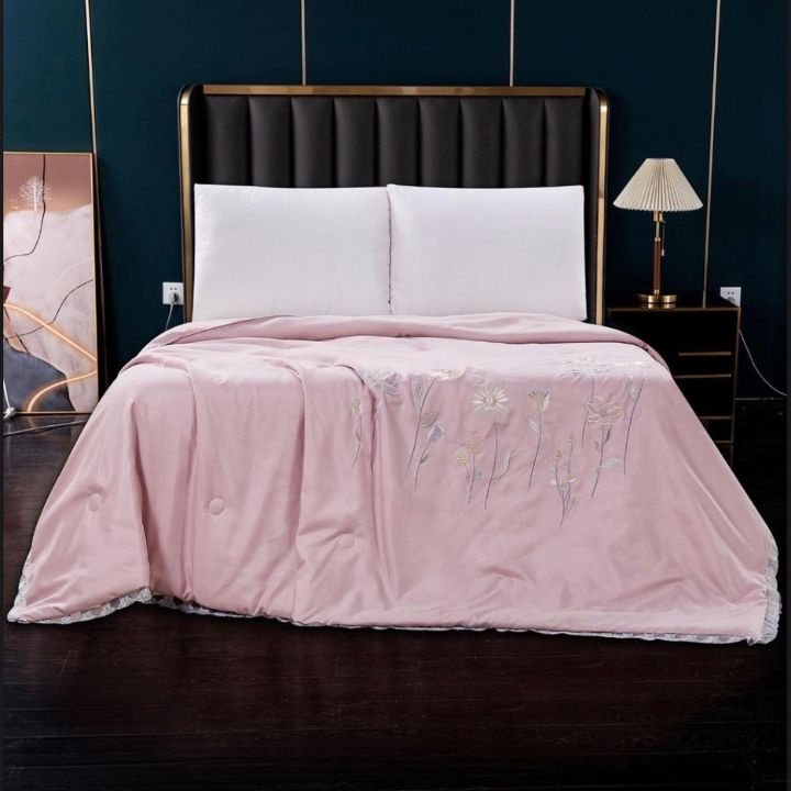 Luxury solid comforter with embroidery from The Gharnish, featuring charming design and summer collection style.