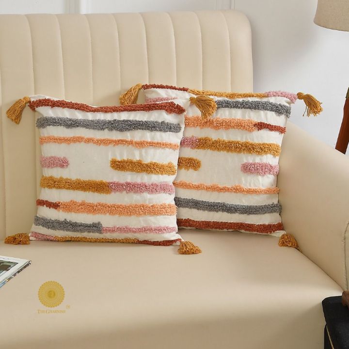 Set of two Bohe handloom cushion covers from The Gharnish, 16x16 inches, featuring intricate woven patterns and vibrant colors.