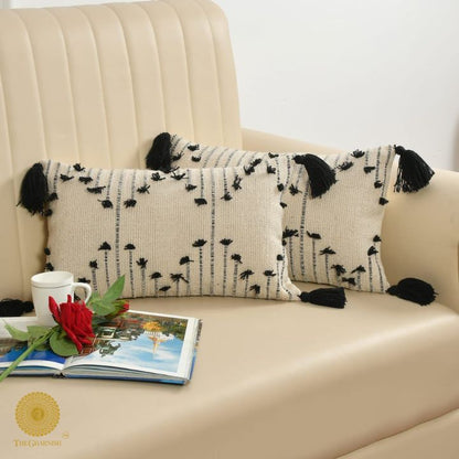 Set of two handcrafted cushion covers with tassels by The Gharnish, 16x16 inches, stylish and decorative for living spaces.