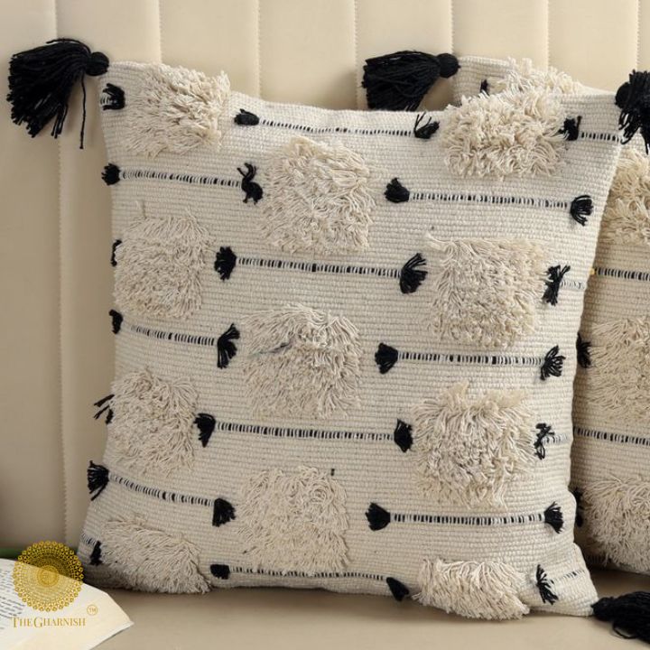 Set of two handcrafted cushion covers with tassels by The Gharnish, 16x16 inches, stylish and decorative for home decor.