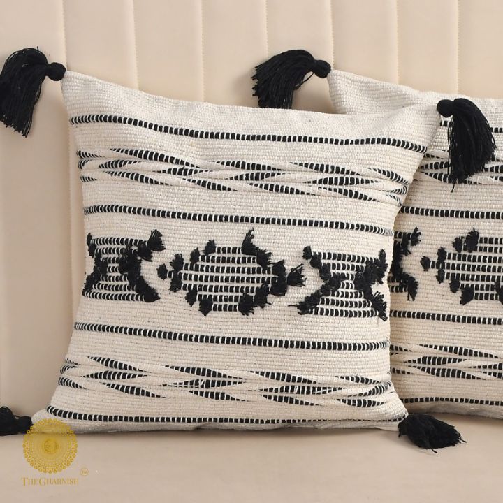 Set of two handcrafted cushion covers with tassels from The Gharnish, 16x16 inches, stylish and decorative for home decor.