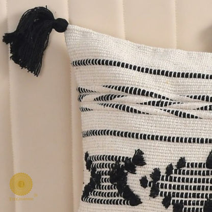 Set of two handcrafted cushion covers with tassels by The Gharnish, 16x16 inches, stylish decorative cushions for sofas or beds.