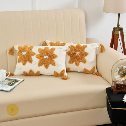 Set of two yellow and white handcrafted cushion covers by The Gharnish, 16x16 inches, soft fabric with elegant design.