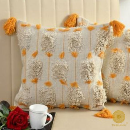Boho premium cushion covers with tassels by The Gharnish, featuring intricate design and soft fabric for stylish home decor.