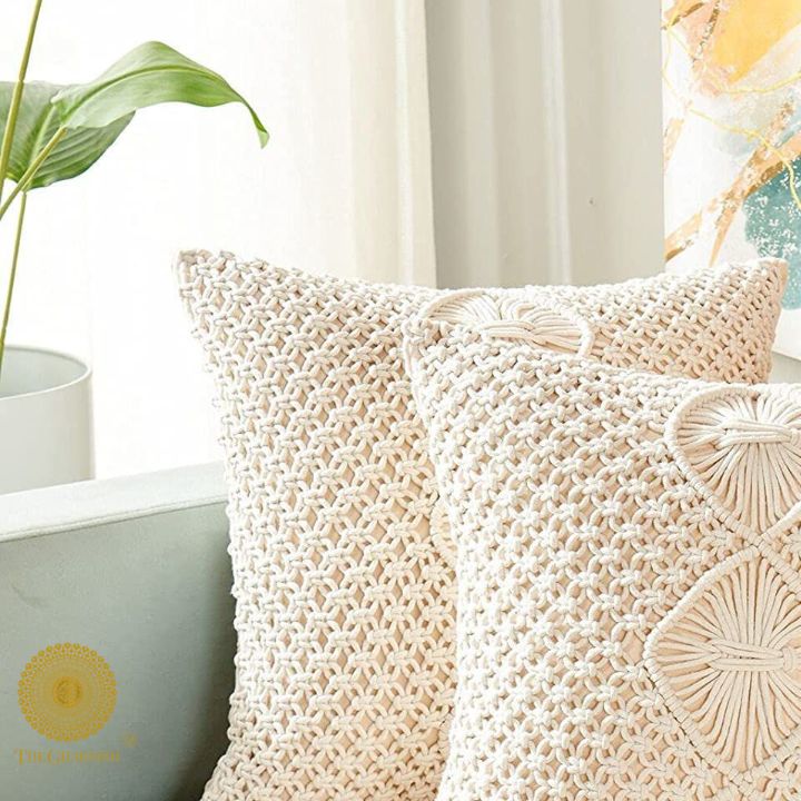 Pack of two cotton rope knitted cushion covers by The Gharnish, featuring textured fabric and neutral tones for cozy home decor.