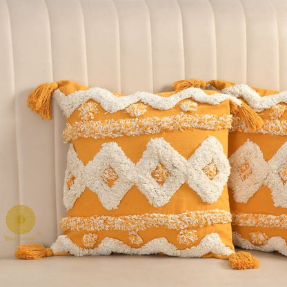 Set of two hand-embroidered cotton sofa cushion covers by The Gharnish, featuring intricate embroidery and soft fabric for stylish comfort.