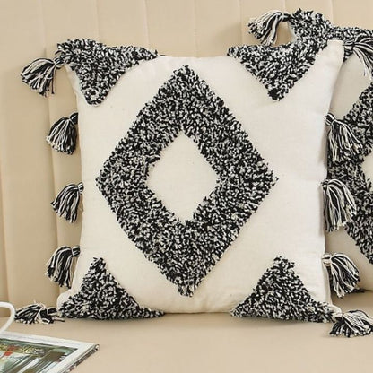 Set of two handcrafted boho cushion covers by The Gharnish, featuring vibrant patterns and soft fabric for stylish home decor.