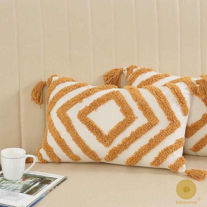 Set of two handcrafted cushion covers by The Gharnish, featuring vibrant traditional designs for decorative cushions.
