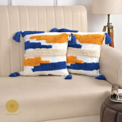 Set of two multicolor tufted cushion covers by The Gharnish, featuring vibrant patterns and soft fabric for stylish home decor.