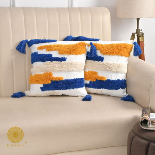 Set of two multicolor tufted cushion covers by The Gharnish, featuring vibrant patterns and soft fabric for stylish home decor.