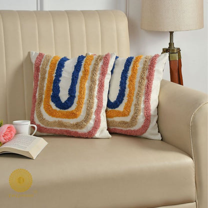 Set of 2 multicolor woven design cushion covers by The Gharnish, showcasing vibrant patterns and textured fabric for home decor.