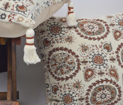 Pure cotton Hanblocked cushion cover with tassels from The Gharnish, featuring intricate hand-blocked patterns and decorative tassels.