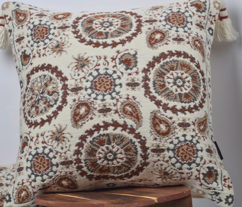 Pure cotton Hanblocked cushion cover with tussels from The Gharnish, featuring intricate design and decorative tassels.