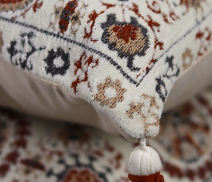 Pure cotton Hanblocked cushion cover with tussels by The Gharnish, featuring intricate design and decorative tassels.