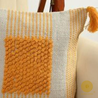 Set of 2 cotton cushion covers with tassels by The Gharnish, featuring soft fabric and decorative tassel accents for cozy home decor.