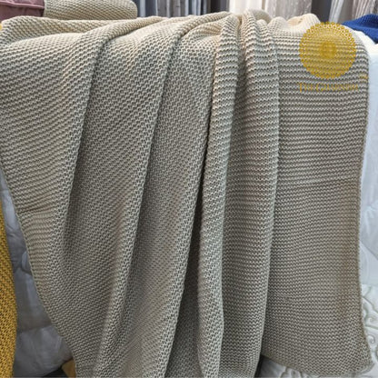 Wrapped in luxurious softness, these throws are knitted with precision to ensure a delicate balance between warmth and breathability. Whether you're curling up on the couch with a book, enjoying a movie night with loved ones, or simply seeking solace from the chilly weather, our throws offer the perfect companion.