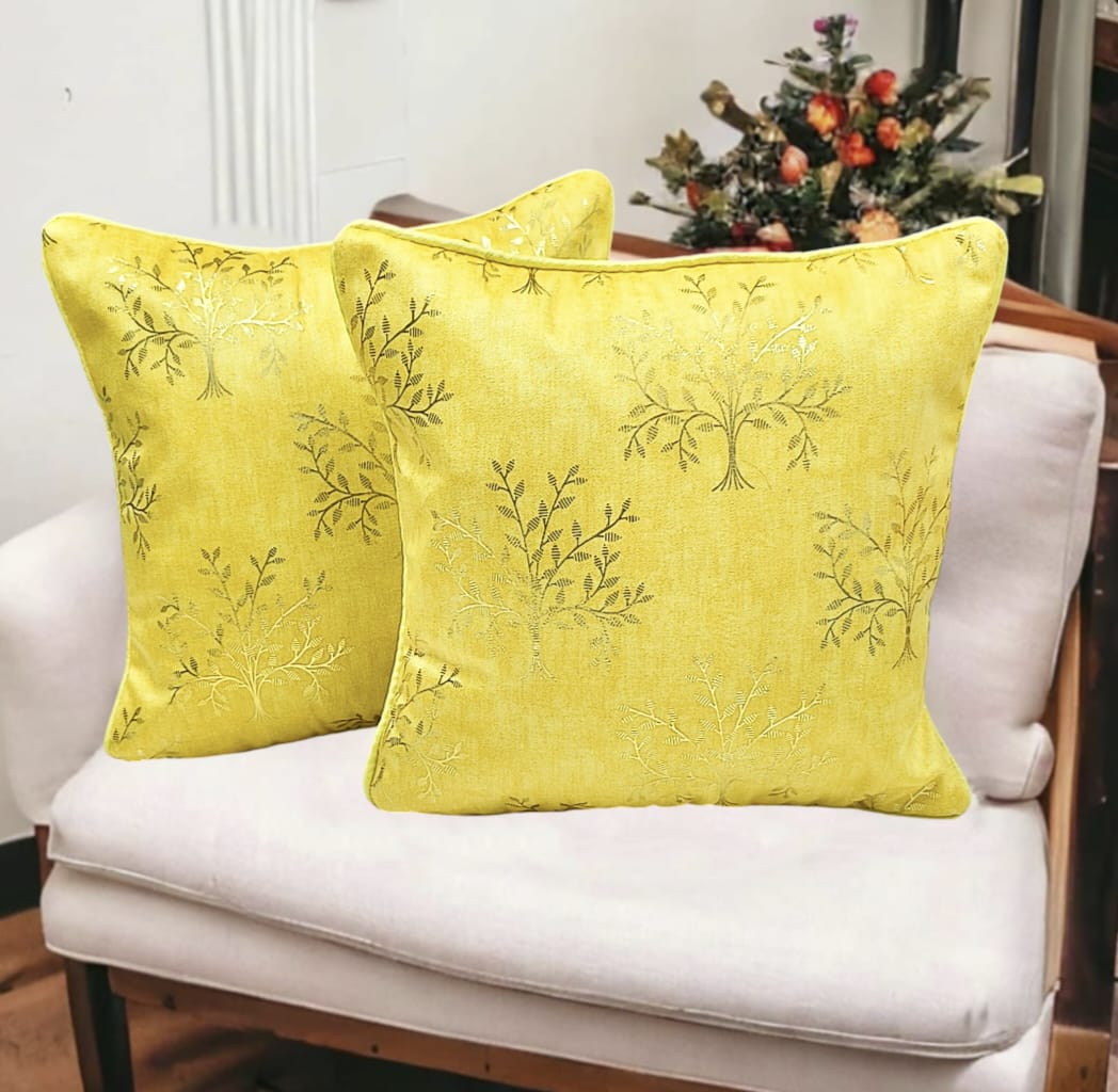 Set of two The Gharnish printed cushion covers with vibrant floral patterns, perfect for home decor and sofa accents.