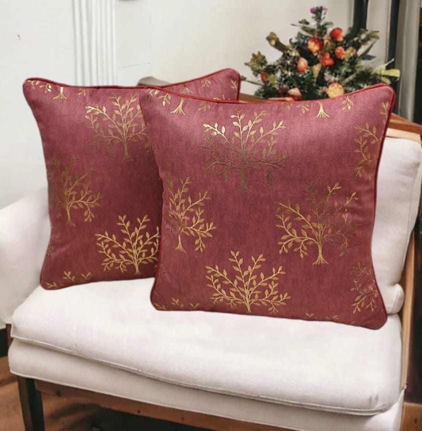 Set of two beautiful printed cushion covers by The Gharnish, featuring intricate designs on soft fabric for decorative cushions.