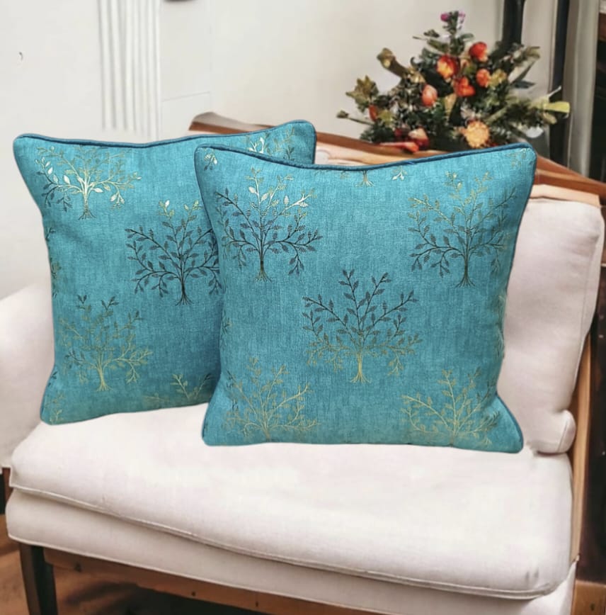 Set of 2 The Gharnish printed cushion covers with colorful, intricate patterns on soft fabric, perfect for home decor.