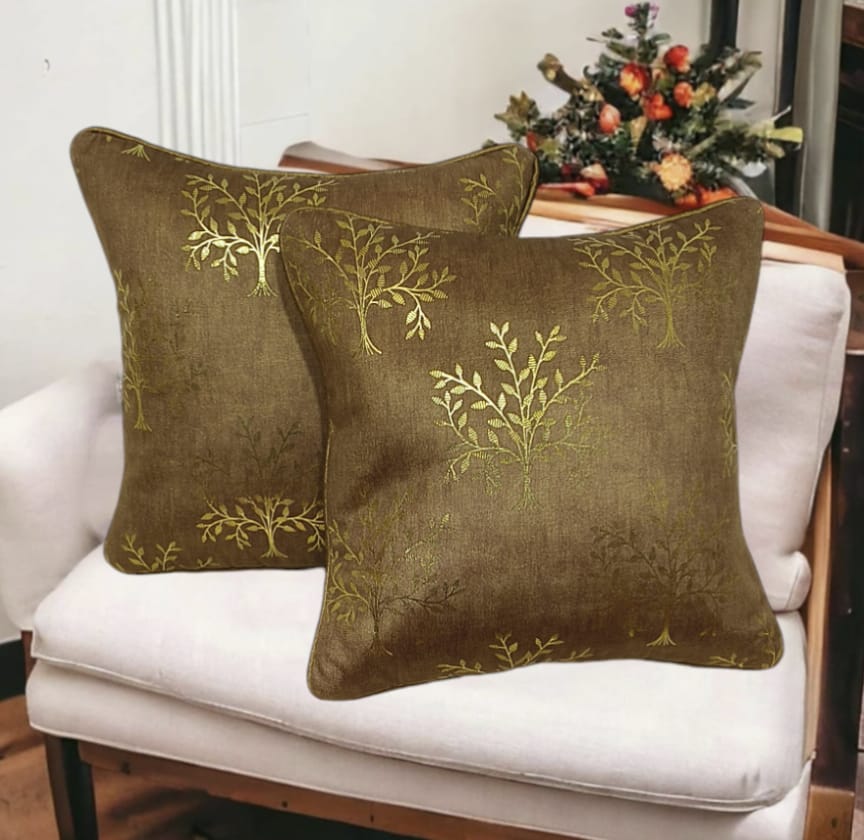 Set of two beautiful printed cushion covers by The Gharnish, featuring colorful and intricate fabric designs for home decor.