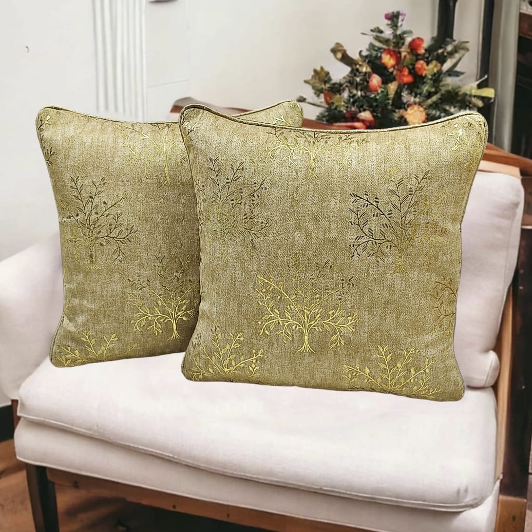 Set of two printed cushion covers by The Gharnish featuring colorful, intricate floral designs on soft fabric.