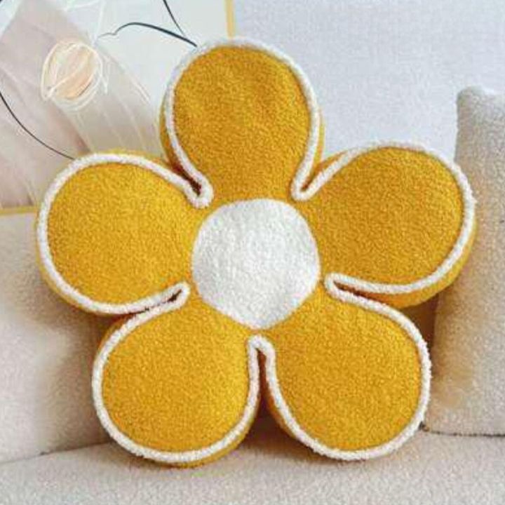 Flower plush seat cushion by The Gharnish featuring a soft, colorful floral design for comfortable seating.