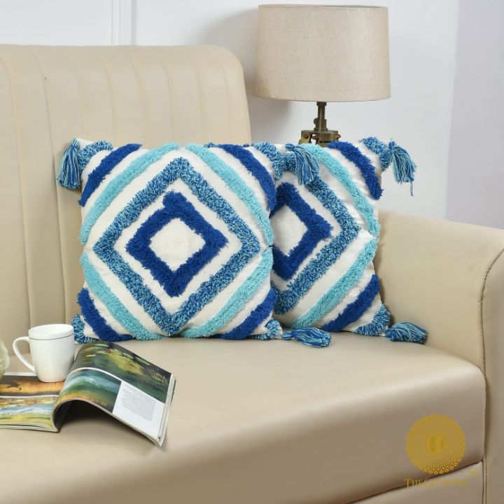 Handcrafted white and blue tassels cushions set of 2 by The Gharnish, featuring decorative fringes and soft fabric for home decor