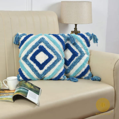Handcrafted white and blue tassels cushions set of 2 by The Gharnish, featuring decorative fringes and soft fabric for home decor