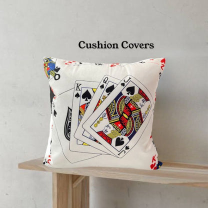 Set of two The Gharnish party cushion covers with vibrant, decorative designs for festive home decor.