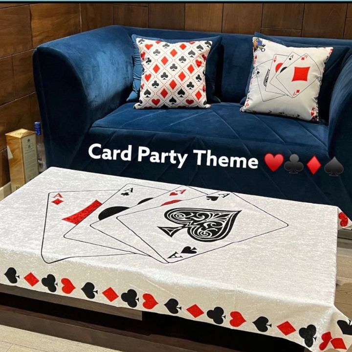 Set of two The Gharnish party cushion covers with vibrant, decorative fabric, perfect for festive home decor.