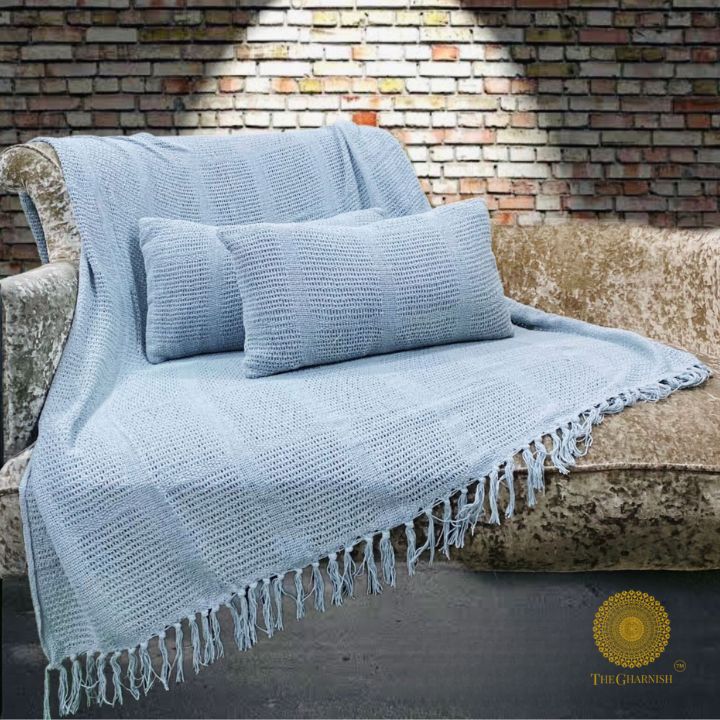 Textured knitted soft throw and pillow set by The Gharnish, featuring cozy cushions with a lightweight, plush design.
